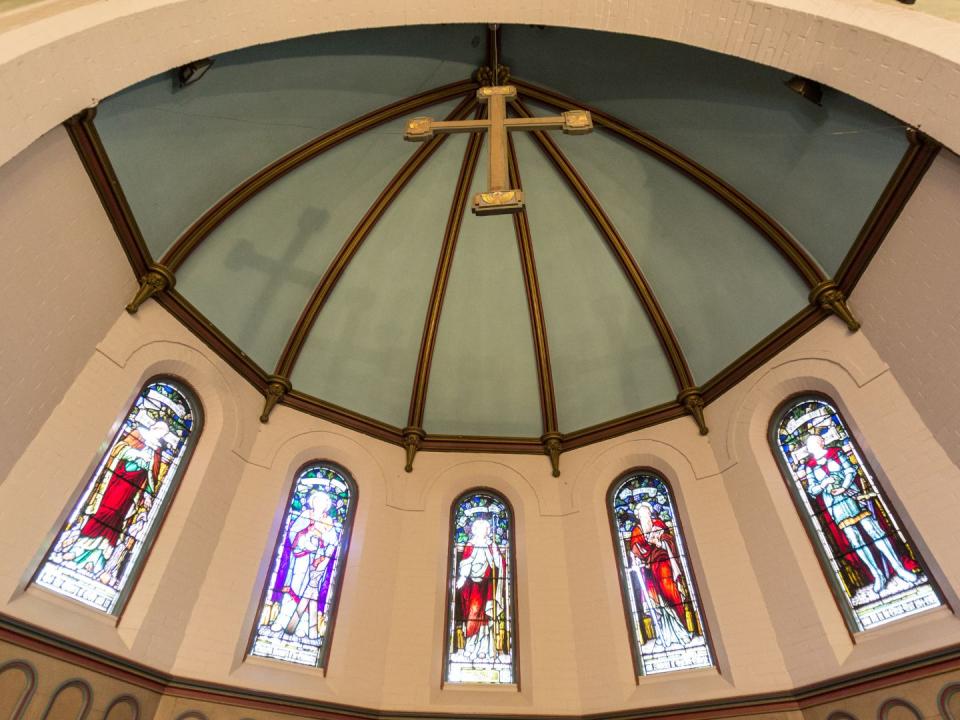 domed ceiling with hanging cross in Founders Chapel at Wycliffe College