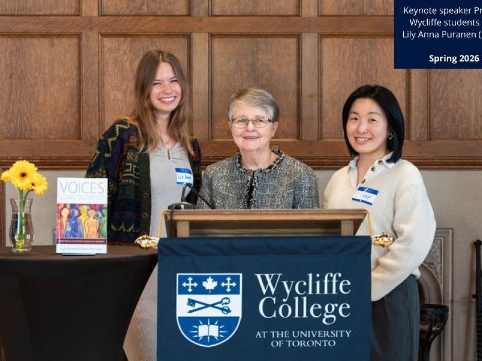 Feb 2026 Women's Breakfast and students at podium