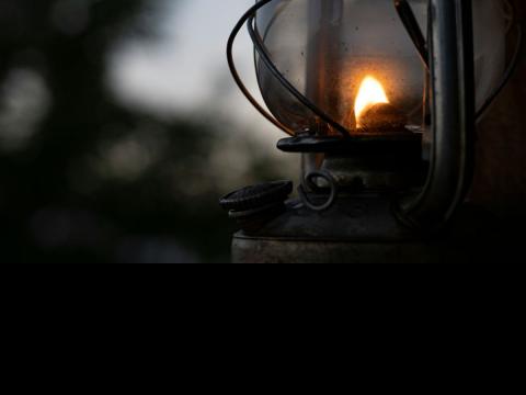 lamp shining at dusk