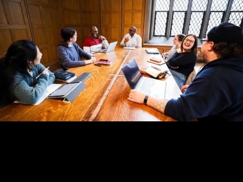 students with V Ezigbo in Great Hall winter 2025