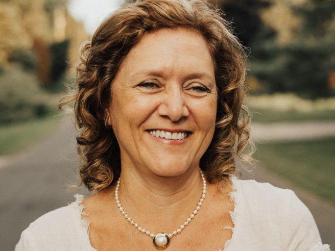 M Moolman outside on road with autumn background