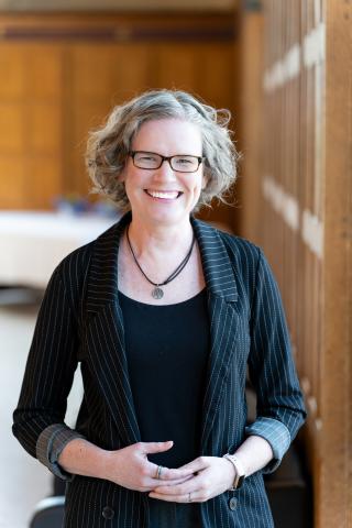 Amanda Ross in Great Hall with wood panelling (2025)