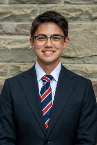 Zakary Herbert headshot in front of Great Hall September 2025