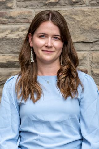 Joycelin Van Caulart headshot outside Great Hall September 2025