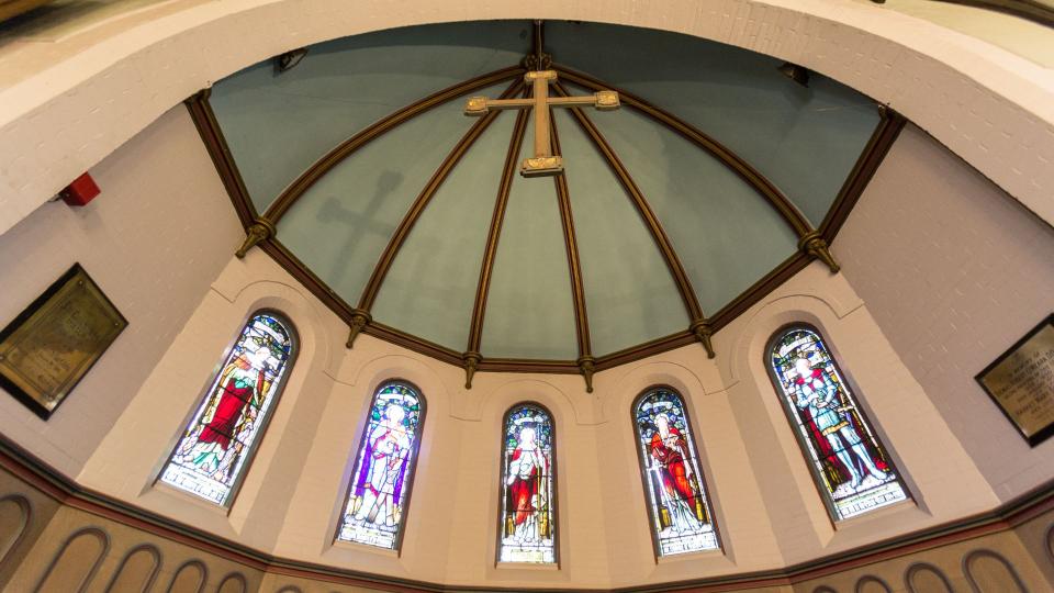 domed ceiling with hanging cross in Founders Chapel at Wycliffe College