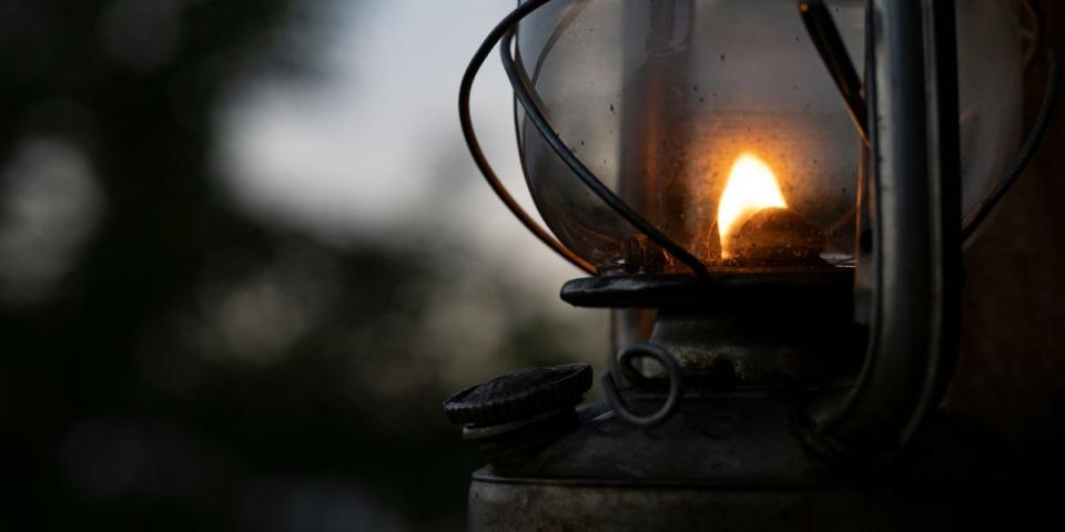 lamp shining at dusk